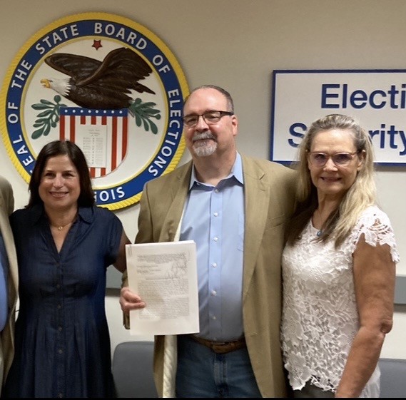 Photo of MWRD candidates Michelle Pennington, Timothy Rueckert, and Jill Shestokas
